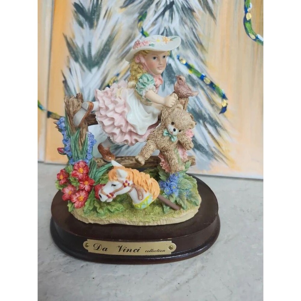 Excal-ibur little girl playing figurine